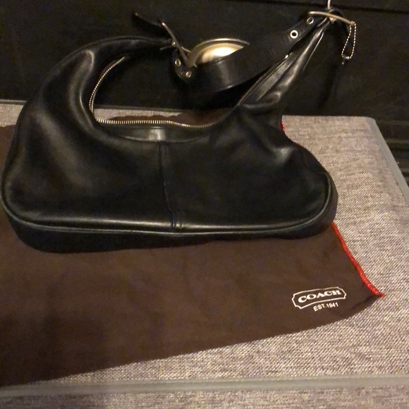 Coach Handbags - 💯Coach Purse And dust bag